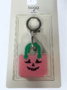 NWT BOGG BAG Pink Silicone Pumpkin Face Keychain with Green Handle